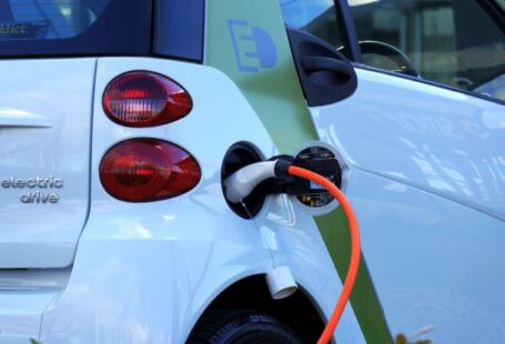Electric Cars - White and Orange Gasoline Nozzle
