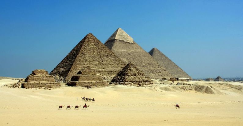 Pyramids - Gray Pyramid on Dessert Under Blue Sky